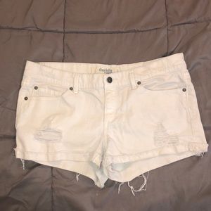 Ripped white shorts